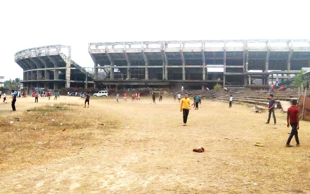 Visitors are seen on the sidelines of the under-construction Multi-Disciplinary Sports Complex, Dimapur on March 14. Originally slated to be completed in 2009, the works for the stadium started in 2005 is yet to be completed. (Morung Photo)